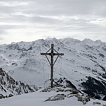 Photo of cross on top of mountain in St. Anton